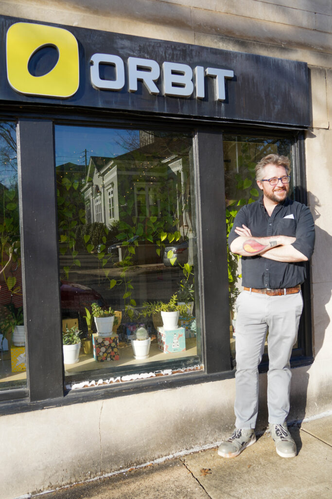 Trent Thomas stands outside Orbit Salon in Birmingham.